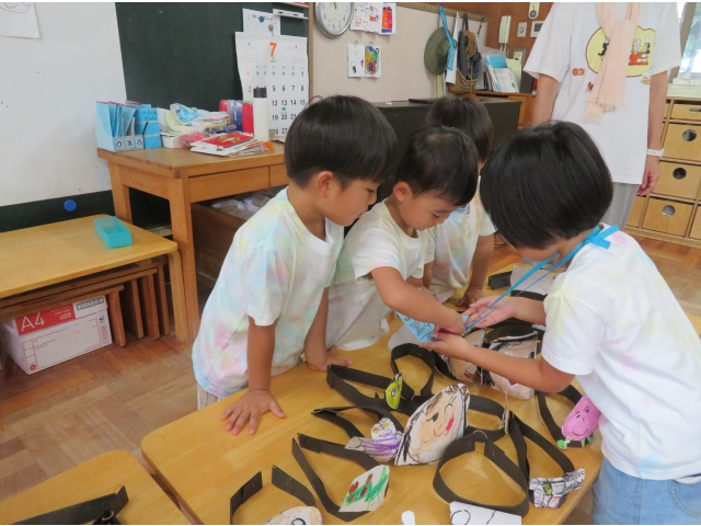 このお面をください!