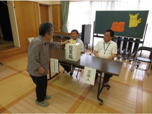 「ここへお願いします」